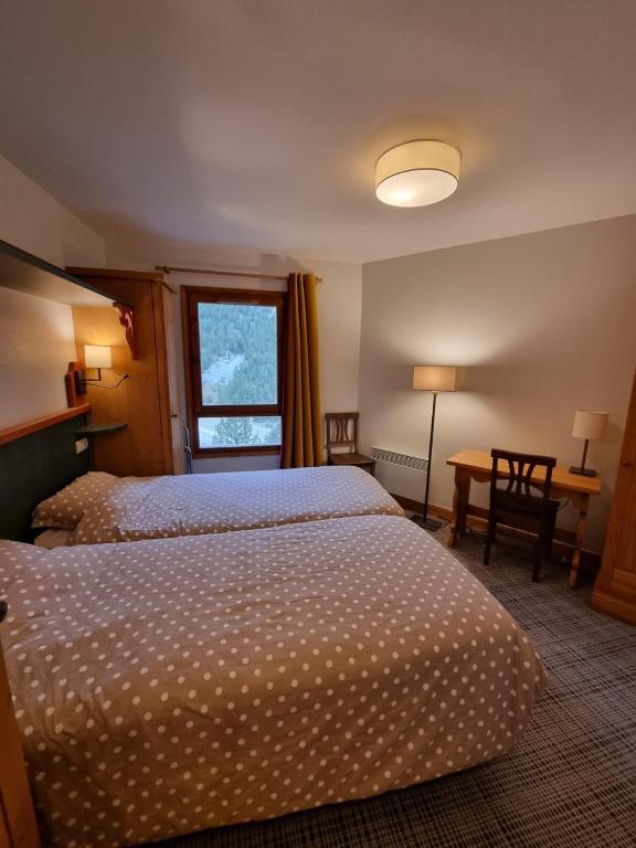 ARC 1950 5 skis au pied piscine 47pers appartement pied des pistes 11