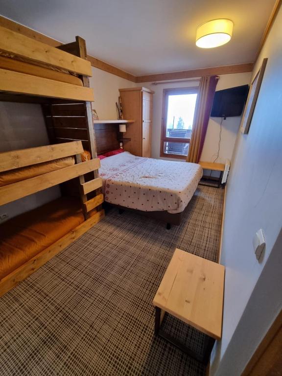 ARC 1950 5 skis au pied piscine 47pers appartement pied des pistes 12