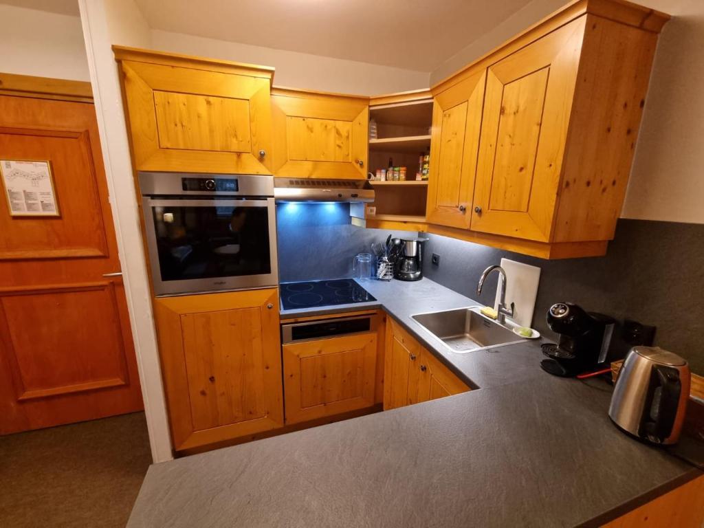 ARC 1950 5 skis au pied piscine 47pers appartement pied des pistes 14