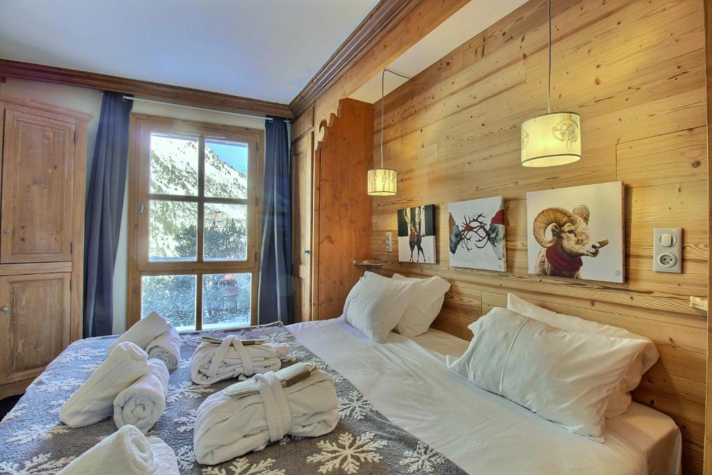 ARC 1950 Appartement 5 personnes ski aux pieds Sauna Hammam Jacuzzi appartement pied des pistes 17