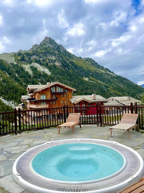 ARC 1950 Appartement 5 personnes ski aux pieds Sauna Hammam Jacuzzi appartement pied des pistes 5