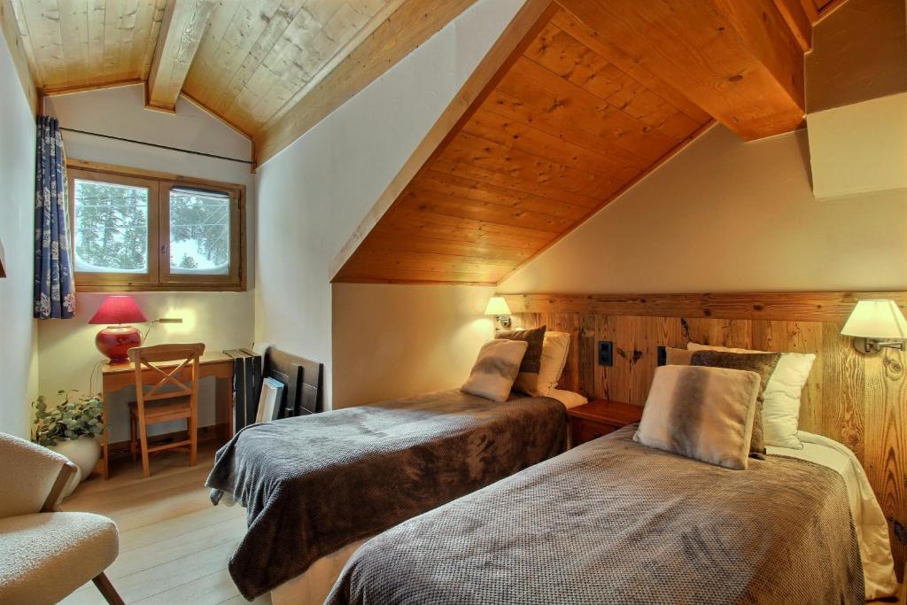 ARC 1950 Appartement 8 personnes Duplex Cheminee ski aux pieds Sauna Hammam Jacuzzi Piscine appartement pied des pistes 1