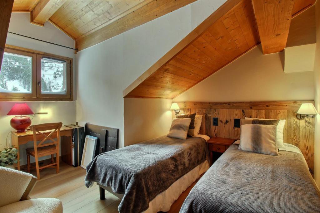 ARC 1950 Appartement 8 personnes Duplex Cheminee ski aux pieds Sauna Hammam Jacuzzi Piscine appartement pied des pistes 14