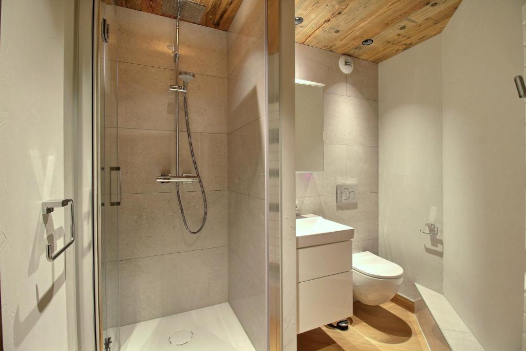 ARC 1950 Appartement 8 personnes Duplex Cheminee ski aux pieds Sauna Hammam Jacuzzi Piscine appartement pied des pistes 18