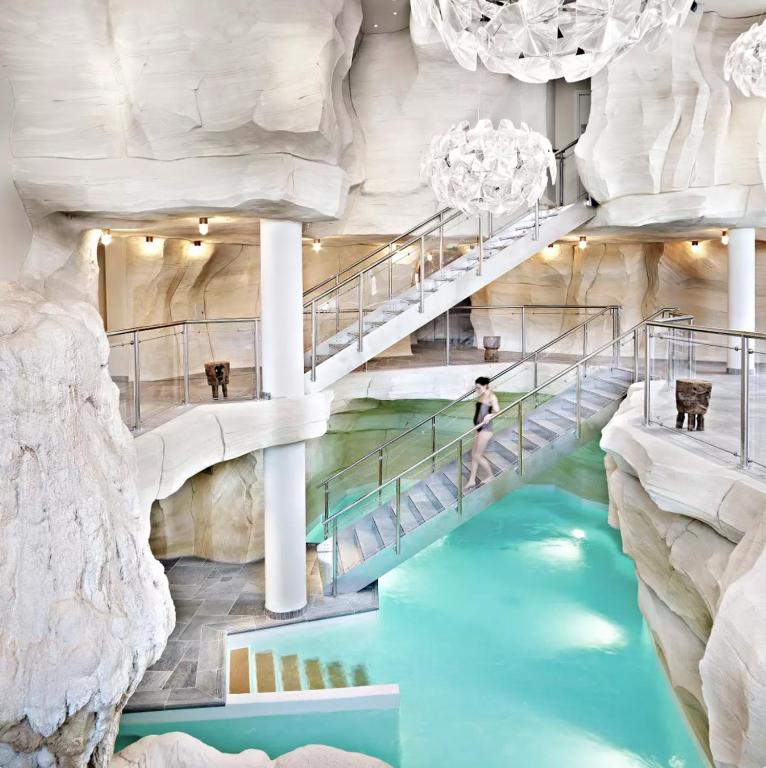 ARC 1950 Appartement 8 personnes Duplex Cheminee ski aux pieds Sauna Hammam Jacuzzi Piscine appartement pied des pistes 3