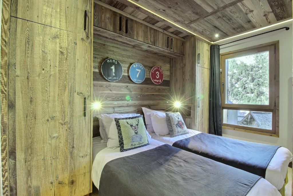 ARC 1950 Appartement style Chalet Haut de Gamme 2 chambres 6 personnes appartement pied des pistes 1