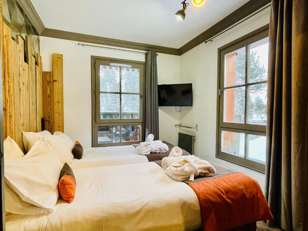 ARC 1950 Appt 68 pers LUXE MANOIR SAVOIE SKI IN SKI OUT appartement pied des pistes 1