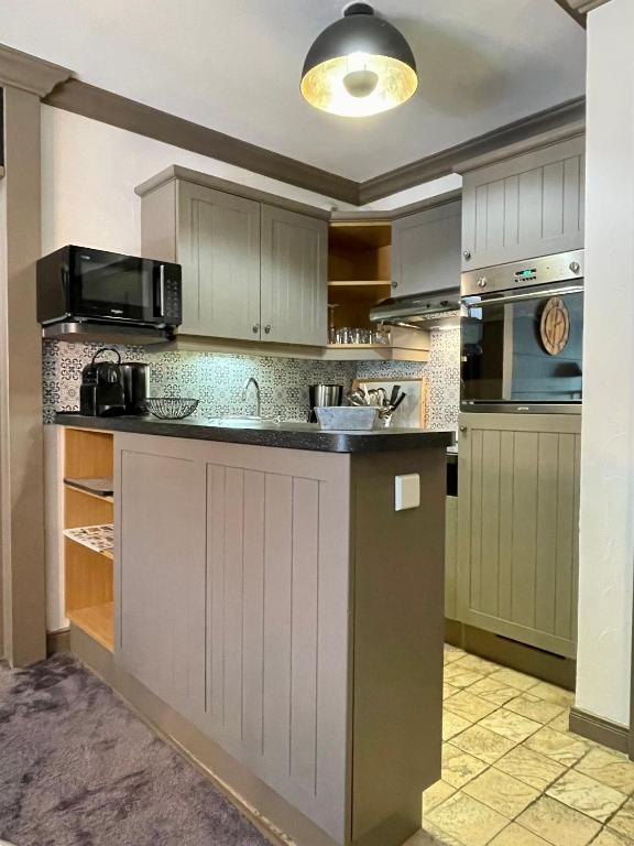 ARC 1950 Appt 68 pers LUXE MANOIR SAVOIE SKI IN SKI OUT appartement pied des pistes 16