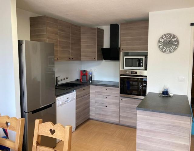 Appartement Duplex Les Orres 1800 pour 8 personnes aux pieds des pistes avec menage et une place de parking inclus appartement pied des pistes 9