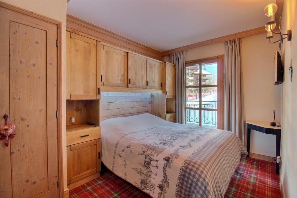 Appartement T3 ARC 1950 skis aux pieds Sauna Hammam Jacuzzi appartement pied des pistes 1