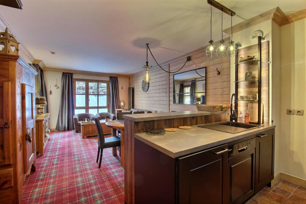 Appartement T3 ARC 1950 skis aux pieds Sauna Hammam Jacuzzi appartement pied des pistes 10