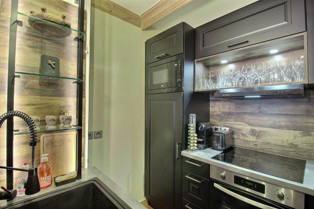 Appartement T3 ARC 1950 skis aux pieds Sauna Hammam Jacuzzi appartement pied des pistes 12