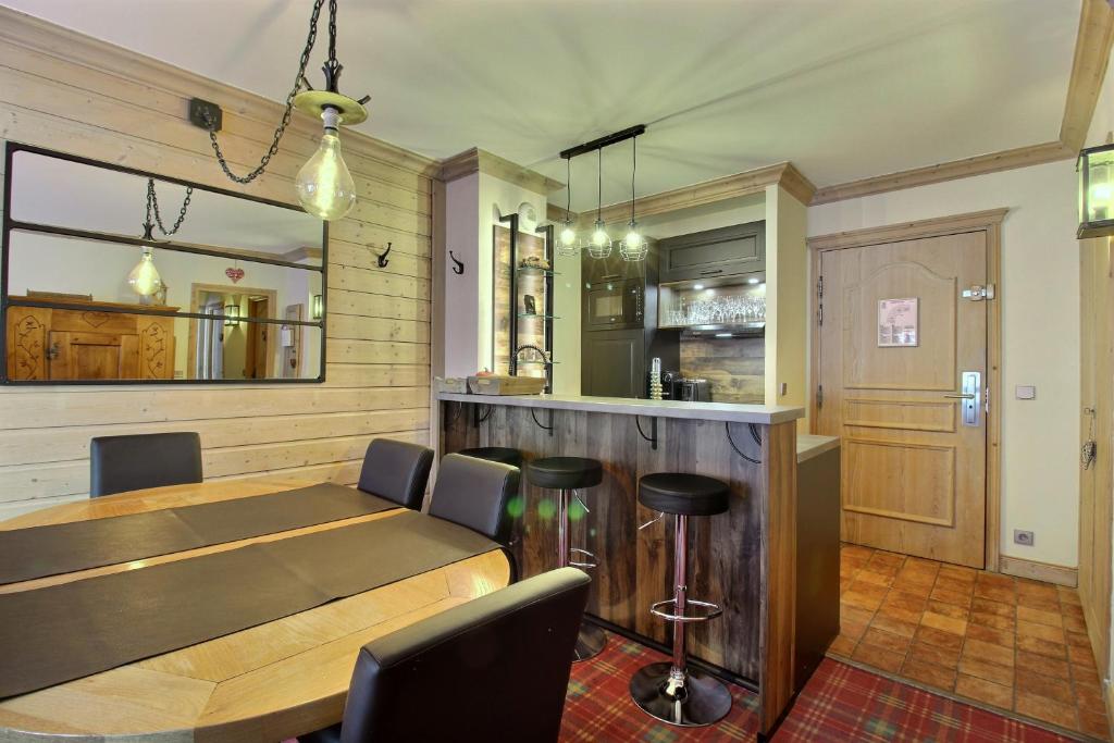 Appartement T3 ARC 1950 skis aux pieds Sauna Hammam Jacuzzi appartement pied des pistes 14