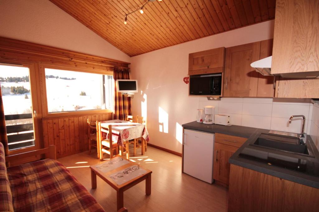 Appt 45 pers. Les Saisies front de neige appartement pied des pistes