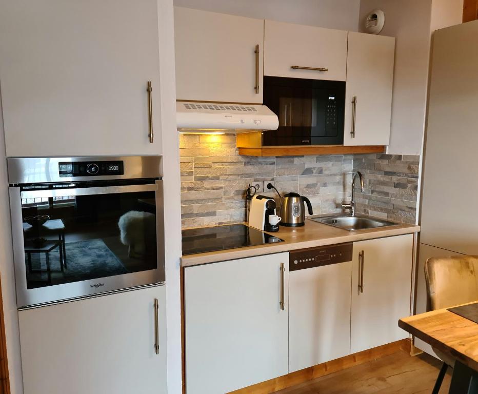 Arc 1950 Appartement de standing Refuge du Montagnard vue incroyable sur le Montblanc skis aux pieds Acces spa et piscine appartement pied des pistes 17
