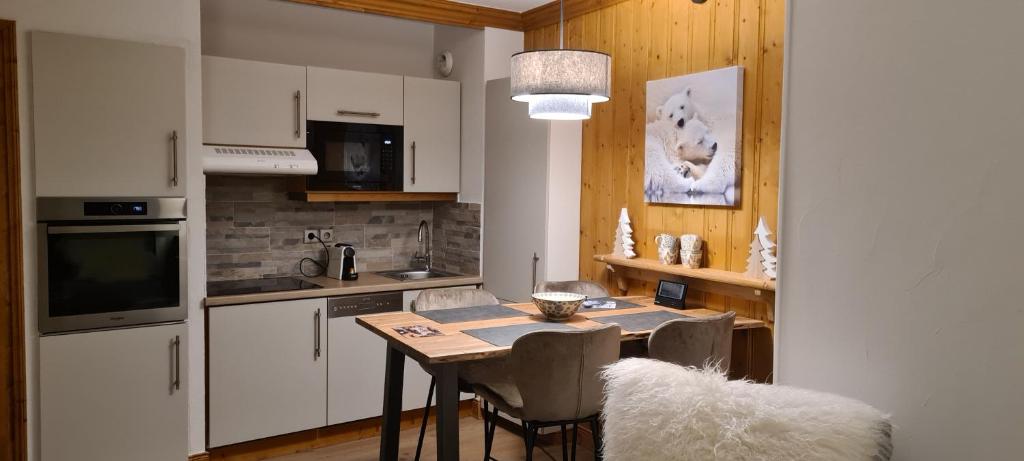 Arc 1950 Appartement de standing Refuge du Montagnard vue incroyable sur le Montblanc skis aux pieds Acces spa et piscine appartement pied des pistes 4