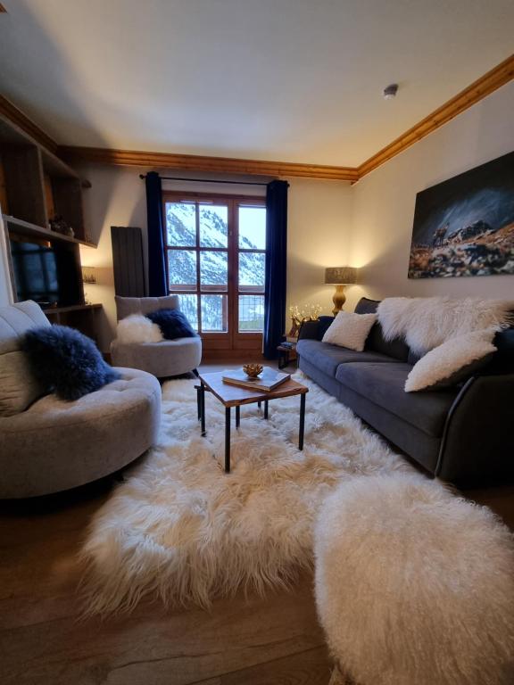 Arc 1950 Appartement de standing Refuge du Montagnard vue incroyable sur le Montblanc skis aux pieds Acces spa et piscine appartement pied des pistes