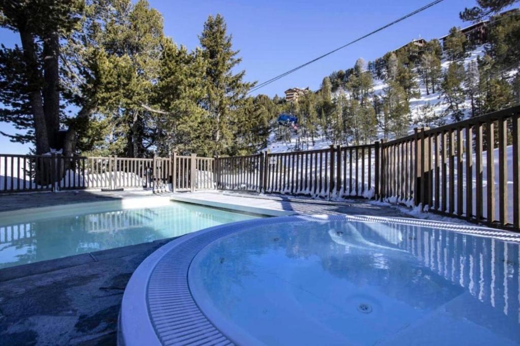 Arc 1950 Appt 2CH 6 pers Res 5 luxe Piscine sauna hamman jacuzzi Classe 5 cristaux Paradiski appartement pied des pistes 3