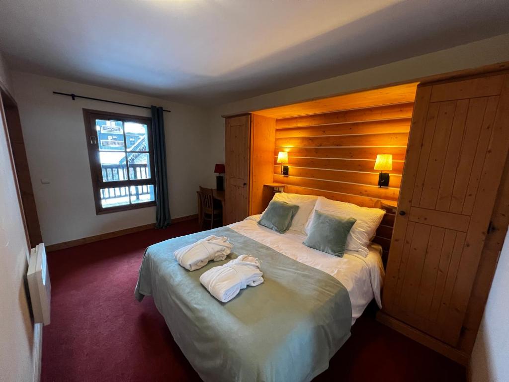 Arc 1950 Auberge Jerome 4 a 6p 1 chambre et 1 coin montagne separe appartement pied des pistes 1