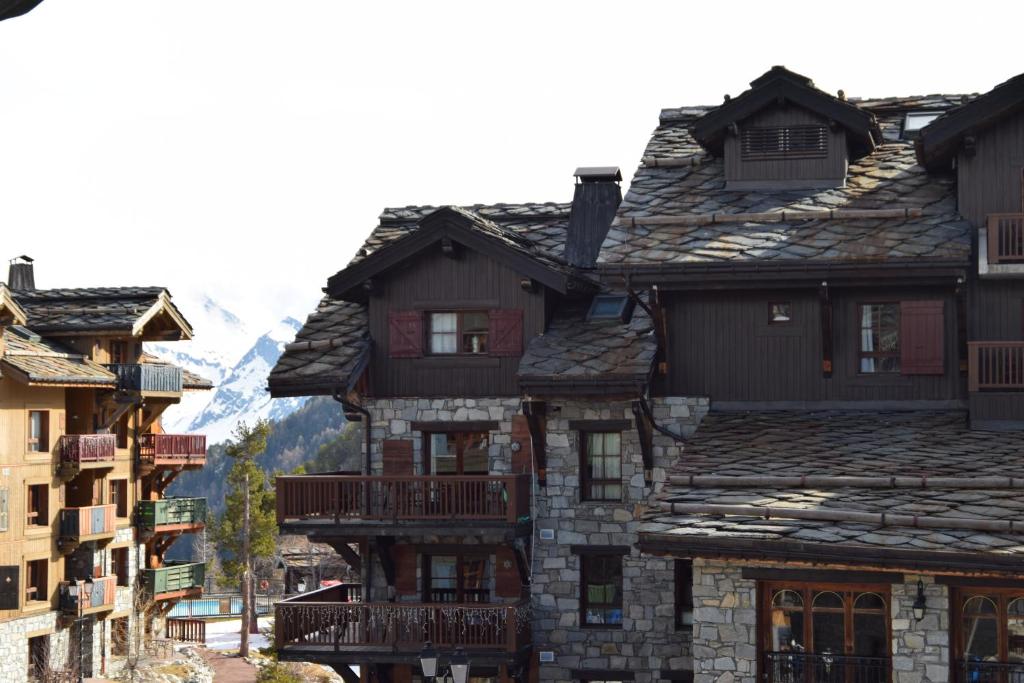 Arc 1950 Auberge Jerome 4 a 6p 1 chambre et 1 coin montagne separe appartement pied des pistes 13