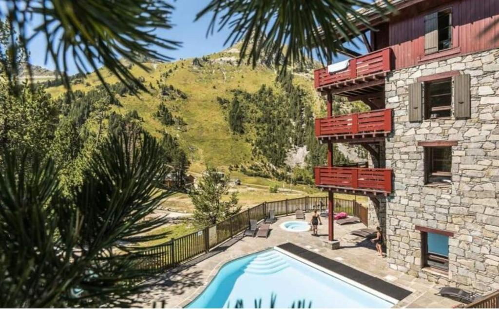 Arc 1950 Auberge Jerome 4 a 6p 1 chambre et 1 coin montagne separe appartement pied des pistes 3