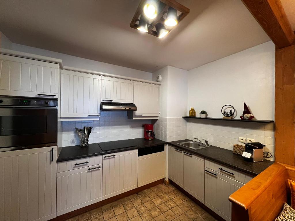Arc 1950 Auberge Jerome 4 a 6p 1 chambre et 1 coin montagne separe appartement pied des pistes 9