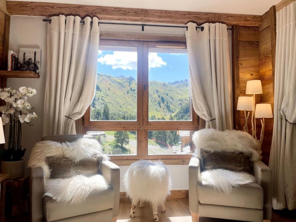 Arc 1950 ambiance chalet luxe 57pers dans residence 5 skis aux pieds avec SPA appartement pied des pistes 11