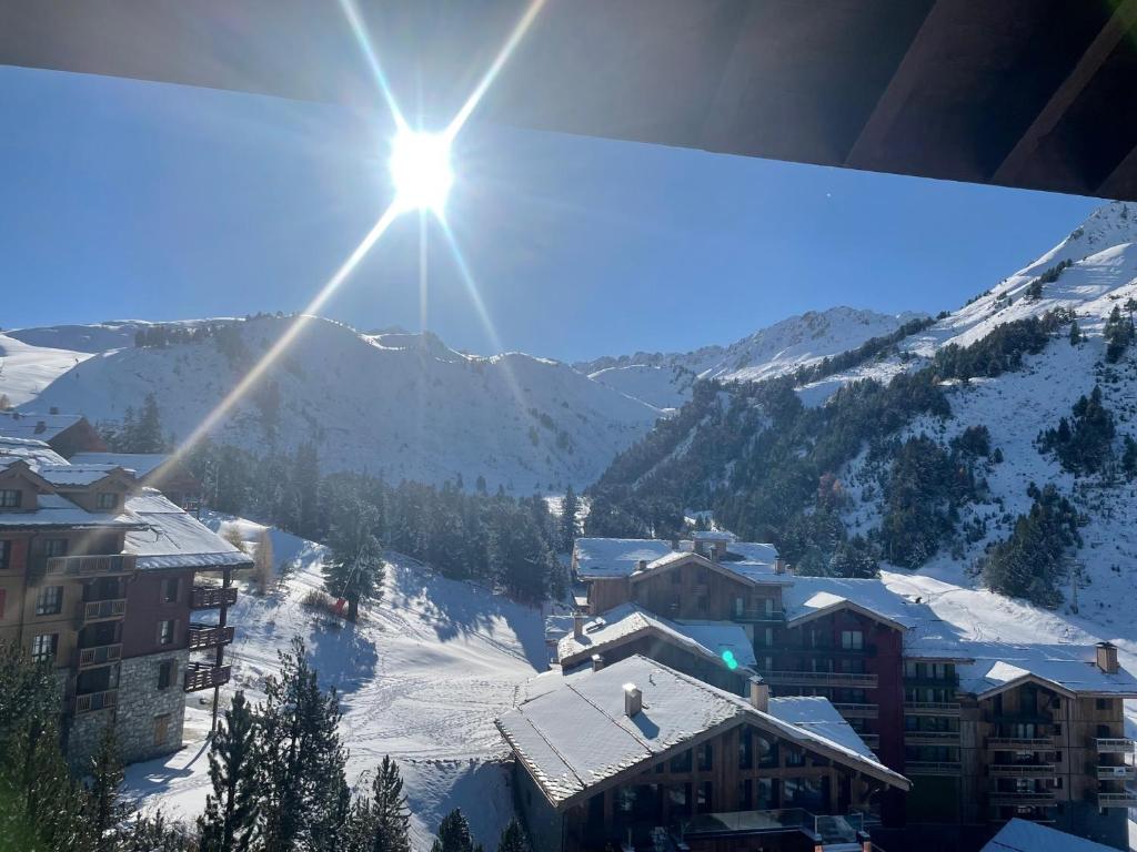 Arc 1950 ambiance chalet luxe 57pers dans residence 5 skis aux pieds avec SPA appartement pied des pistes 14