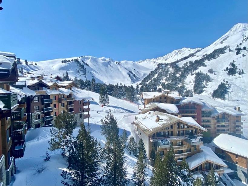 Arc 1950 ambiance chalet luxe 57pers dans residence 5 skis aux pieds avec SPA appartement pied des pistes 16
