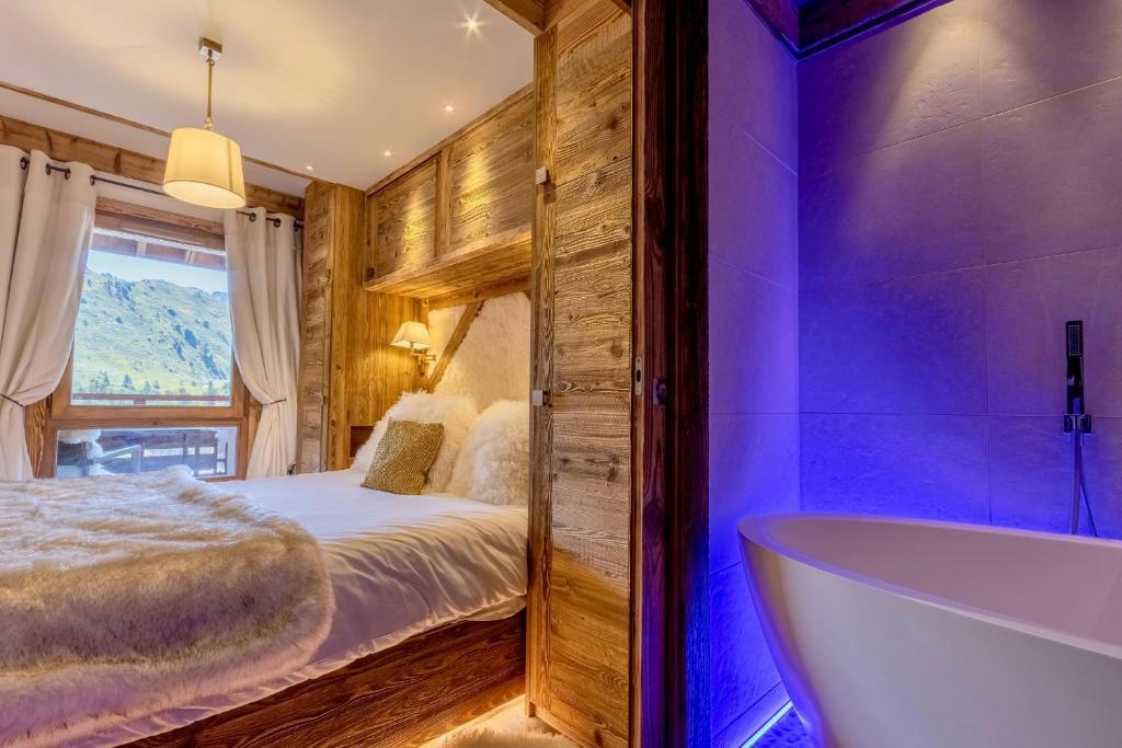 Arc 1950 ambiance chalet luxe 57pers dans residence 5 skis aux pieds avec SPA appartement pied des pistes 19