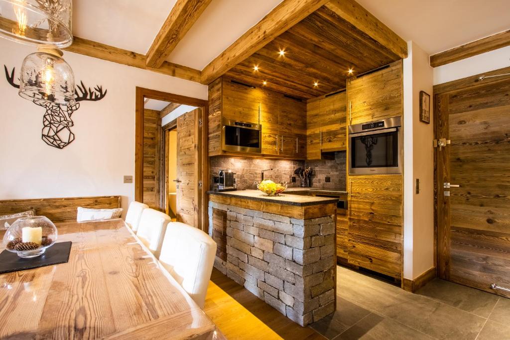 Arc 1950 ambiance chalet luxe 57pers dans residence 5 skis aux pieds avec SPA appartement pied des pistes 6