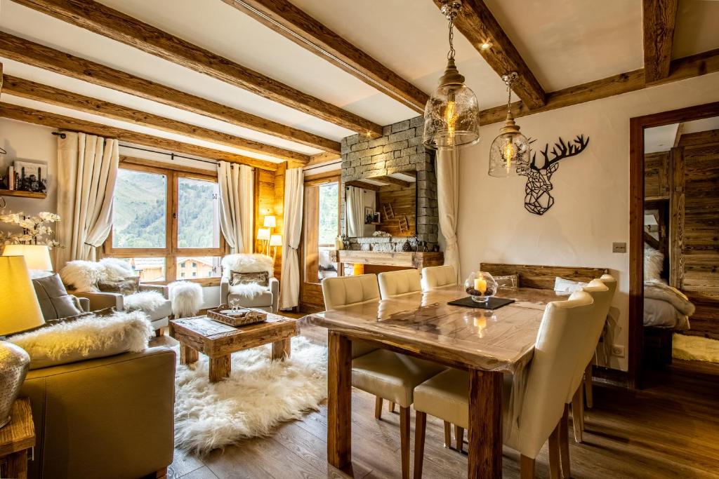 Arc 1950 ambiance chalet luxe 57pers dans residence 5 skis aux pieds avec SPA appartement pied des pistes 8
