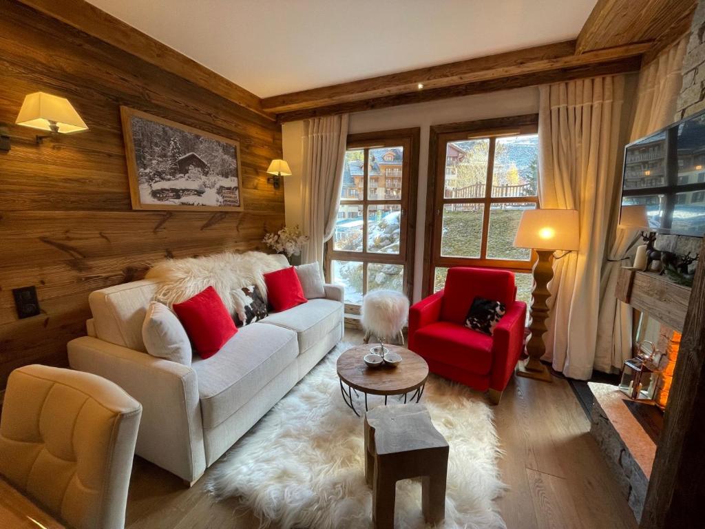 Arc 1950 appt luxe 2 4pers skis aux pieds SPA piscines interieure et exterieure sauna hammam appartement pied des pistes 1