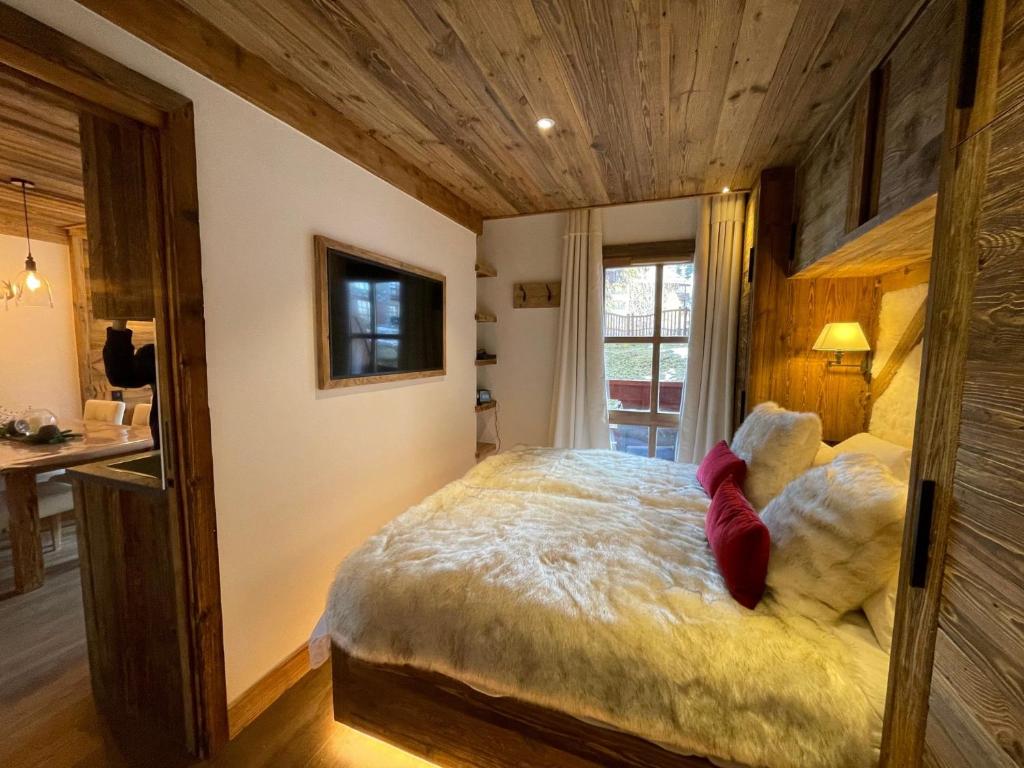 Arc 1950 appt luxe 2 4pers skis aux pieds SPA piscines interieure et exterieure sauna hammam appartement pied des pistes 11