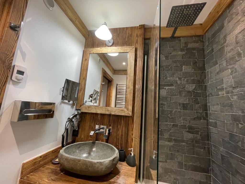 Arc 1950 appt luxe 2 4pers skis aux pieds SPA piscines interieure et exterieure sauna hammam appartement pied des pistes 13