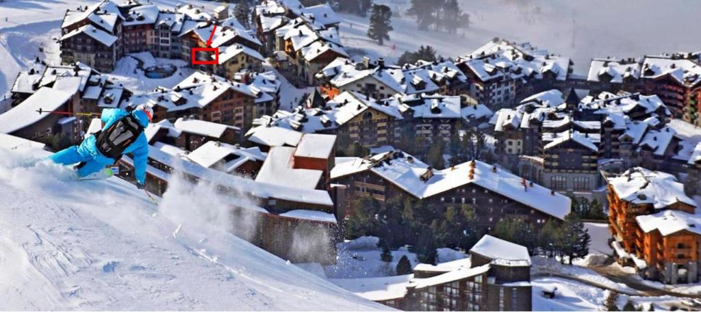 Arc 1950 appt luxe 2 4pers skis aux pieds SPA piscines interieure et exterieure sauna hammam appartement pied des pistes 17