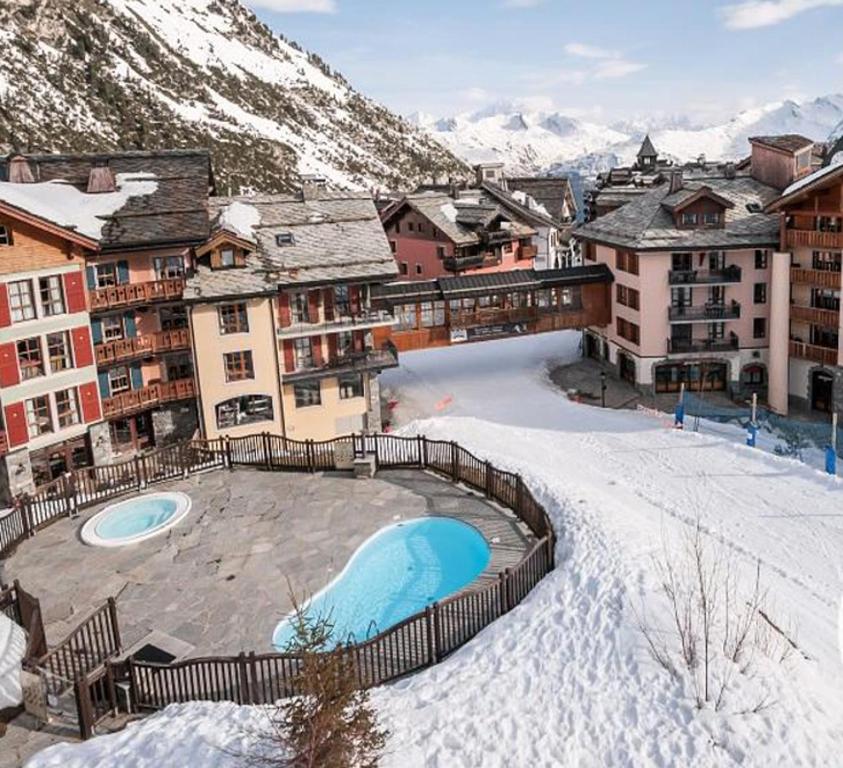 Arc 1950 appt luxe 2 4pers skis aux pieds SPA piscines interieure et exterieure sauna hammam appartement pied des pistes 18