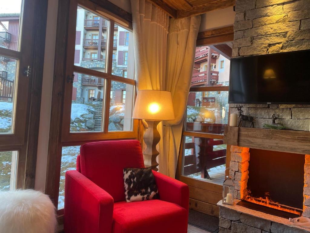 Arc 1950 appt luxe 2 4pers skis aux pieds SPA piscines interieure et exterieure sauna hammam appartement pied des pistes 5