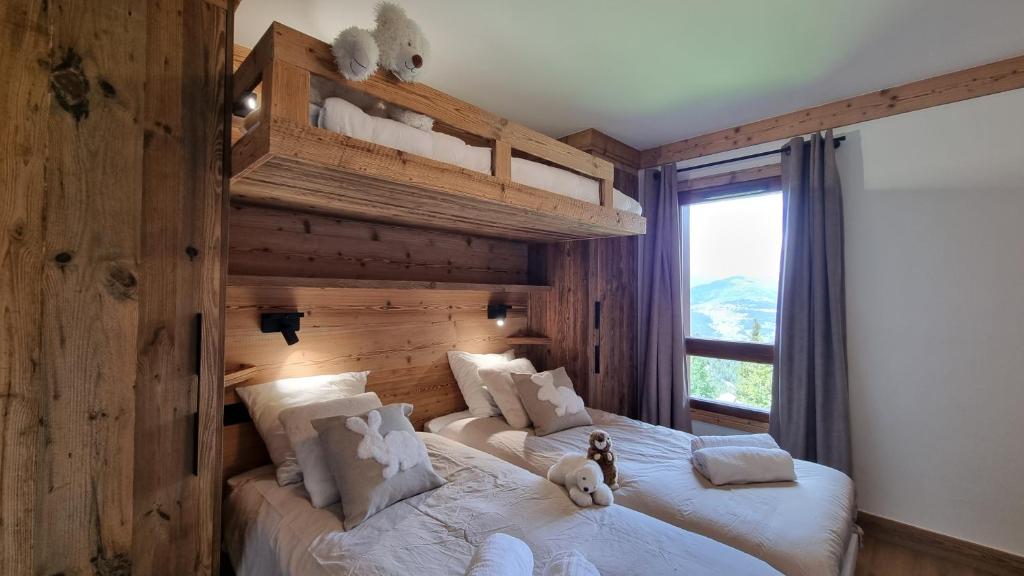 Arcs 1950 Appartement Luxe type chalet 5 a 7 personnes Vue imprenable sur le Montblanc skis aux pieds appartement pied des pistes 1