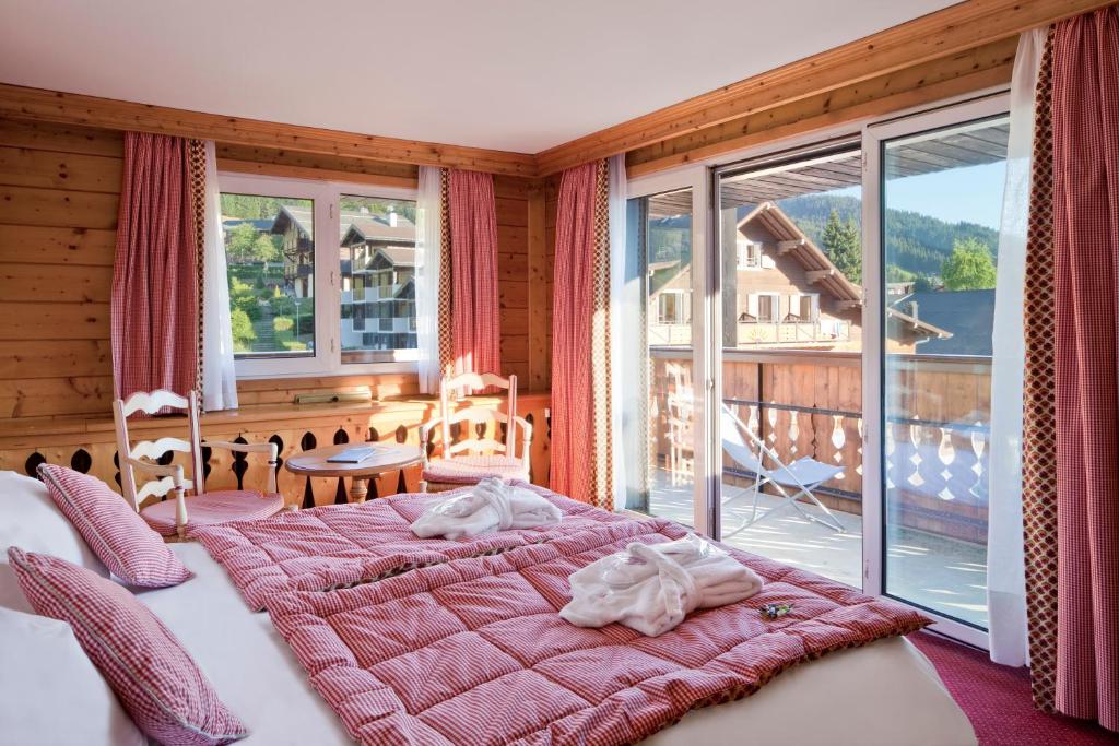 Chalet Hotel La Marmotte La Tapiaz SPA The Originals Relais hotel pied des pistes 1