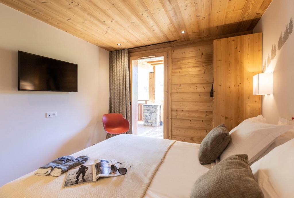 Chalet Hotelier LES EQUINOXES VAL DISERE appartement pied des pistes 10
