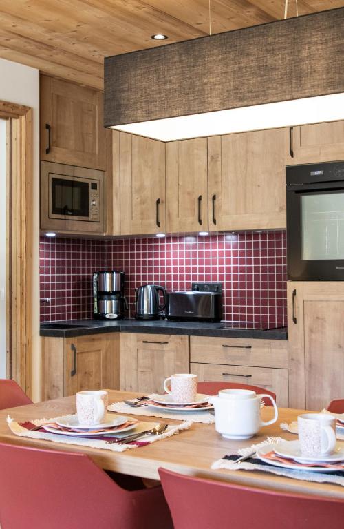 Chalet Hotelier LES EQUINOXES VAL DISERE appartement pied des pistes 16