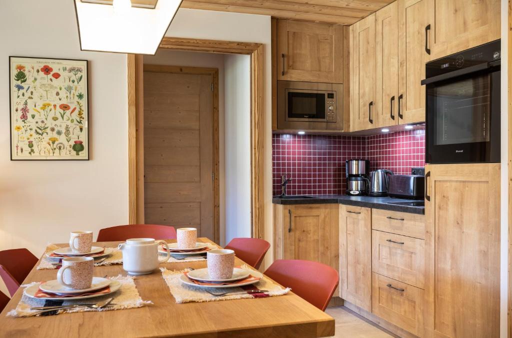 Chalet Hotelier LES EQUINOXES VAL DISERE appartement pied des pistes 19