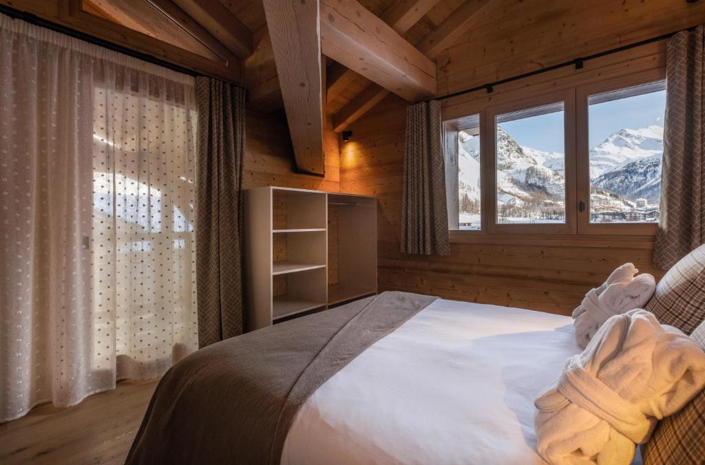 Chalet Hotelier LES EQUINOXES VAL DISERE appartement pied des pistes 5