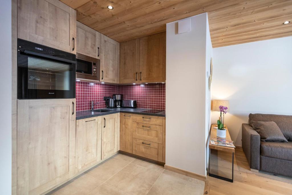 Chalet Hotelier LES EQUINOXES VAL DISERE appartement pied des pistes 7
