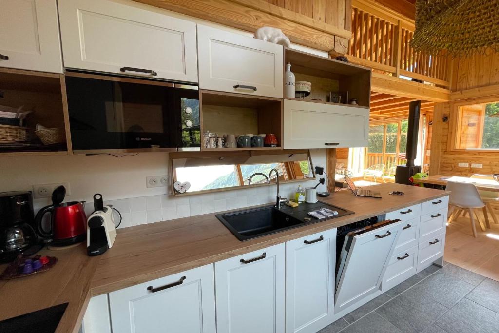 Chalet Mitoyen pour 8 avec BALCON et JARDIN chalet pied des pistes 7