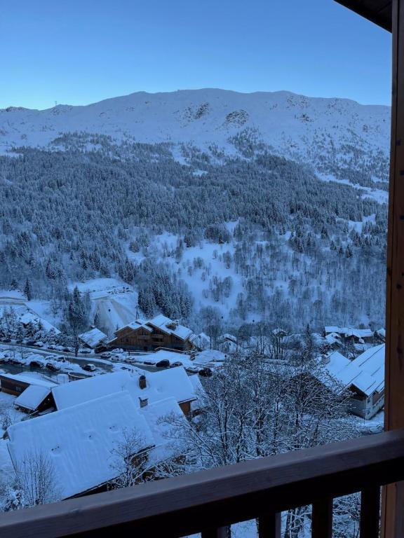 Charmant studio a Meribel avec cheminee appartement pied des pistes 11