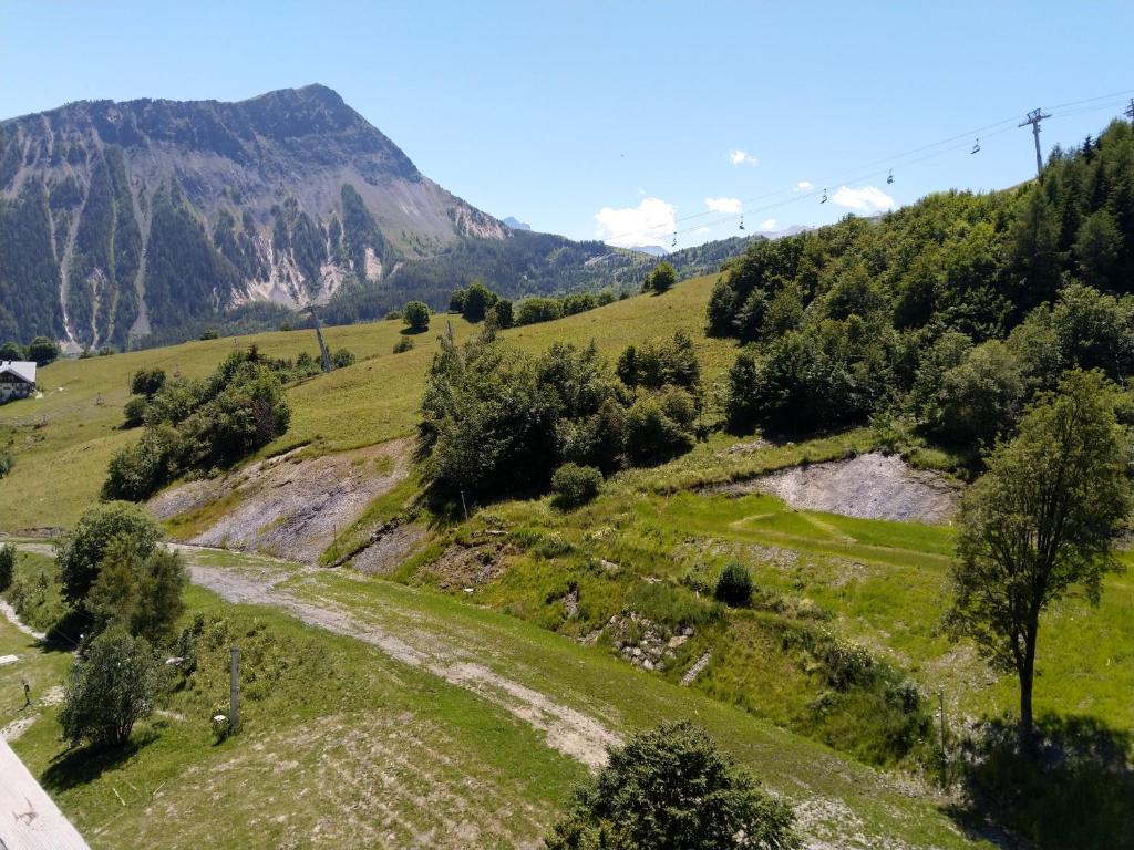 Corbier centre Vostok 32m2 balcon Sud vue pistes Classe Tourisme appartement pied des pistes 15