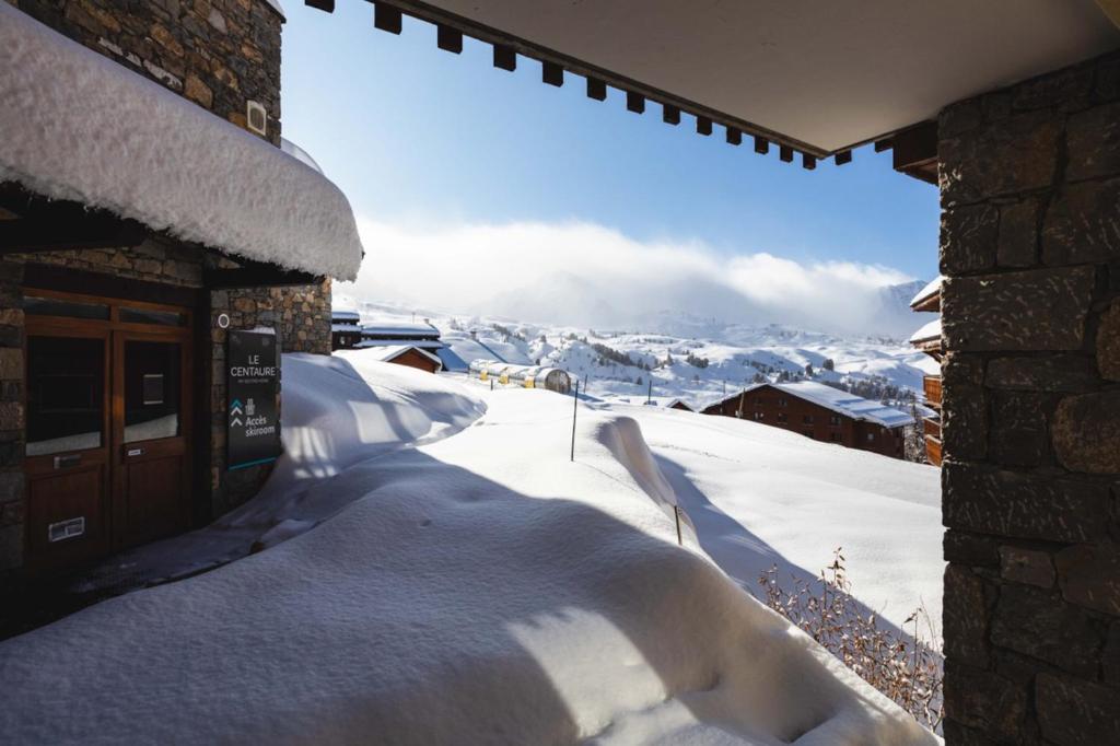 Haut Belle Plagne vue montagnes au pied des pistes proche de lESF espace piscine inclus appartement pied des pistes 8