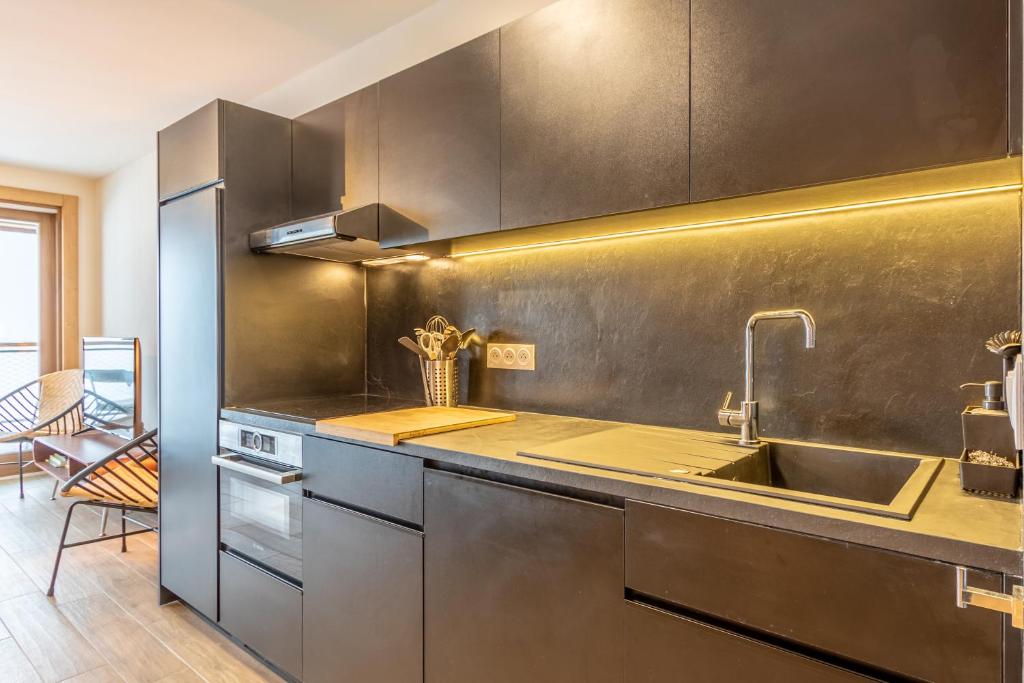 Les ARCS 1600 SKI AUX PIEDS MAGNIFIQUE DUPLEX 12 PERSONNES appartement pied des pistes 14